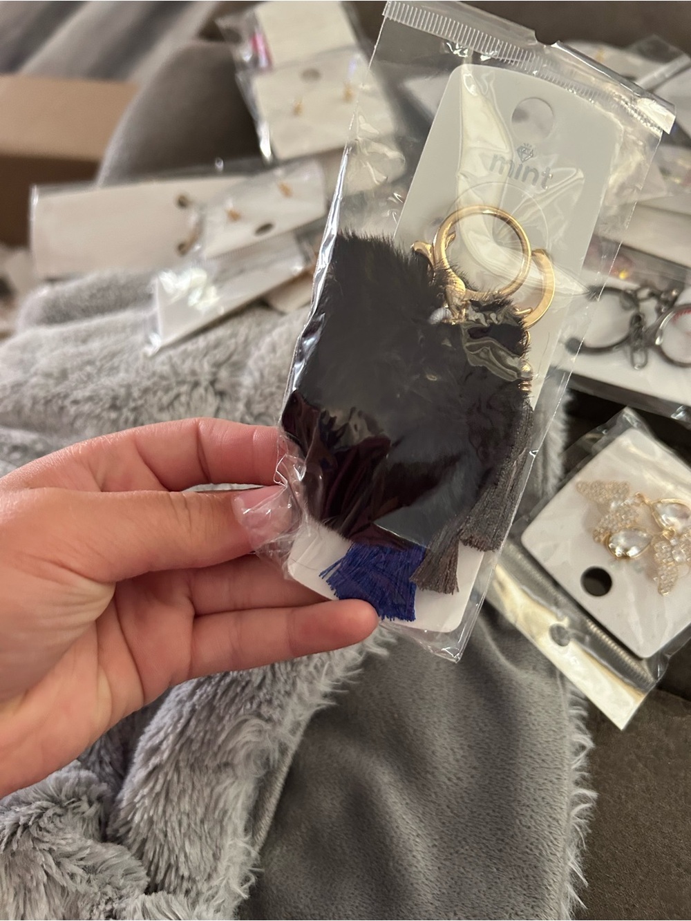 5/$25 Faux Fur Heart Keychain with Tassels - Black & Blue